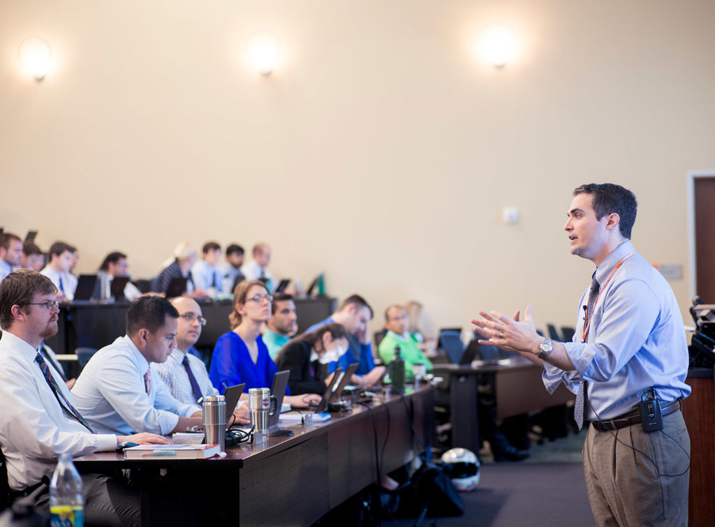 image of faculty and students in classroom