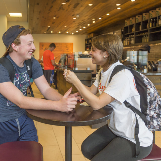 image of students at starbucks