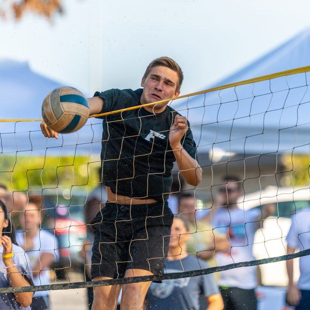 students playing volleyball
