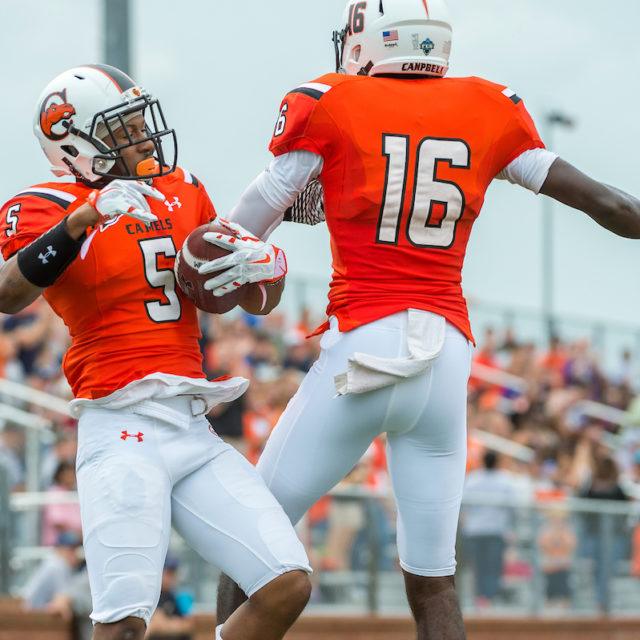 image of happy football athletes