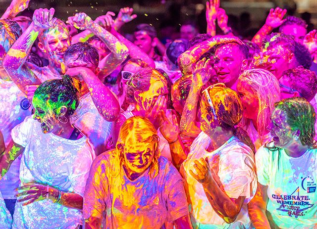 Students have a blast at a paint party during Welcome Week.