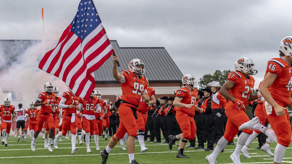 Football players at homecoming game