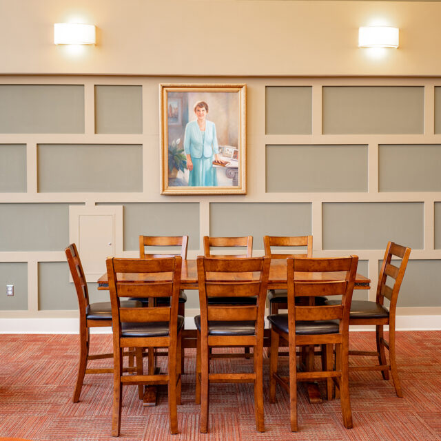 A common area in Pat Parker Hall includes a long table for group study sessions.