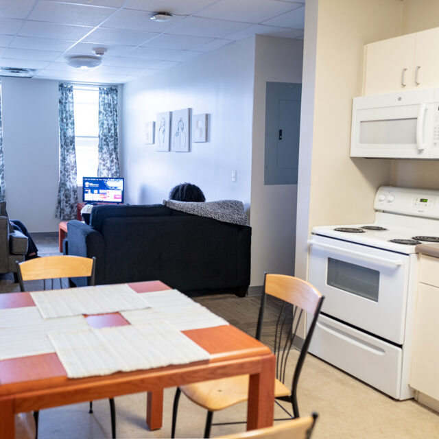 Image of a kitchen inside a suite in Bob Barker Hall.