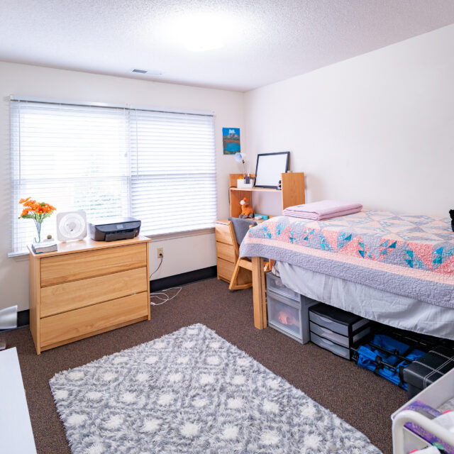 Image of a bedroom inside a Faculty Memorial Commons apartment