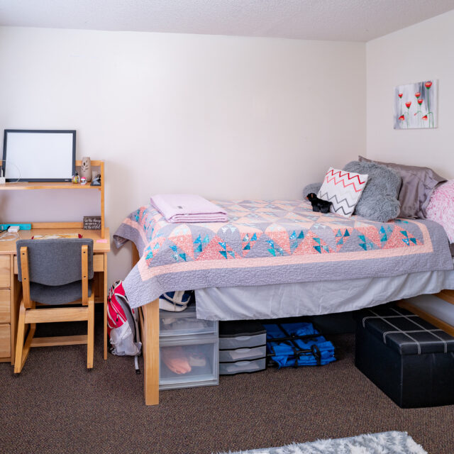 Image of a bedroom inside a Faculty Memorial Commons apartment