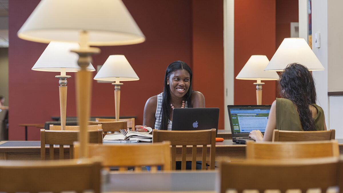 students studying in library