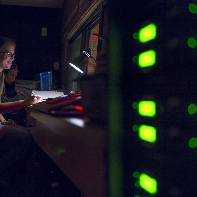 theatre arts student working behind the scenes
