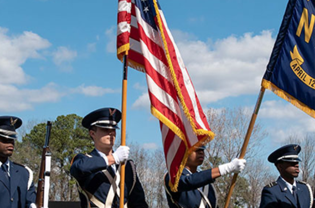AROTC cadets with US and NC flags at FSU