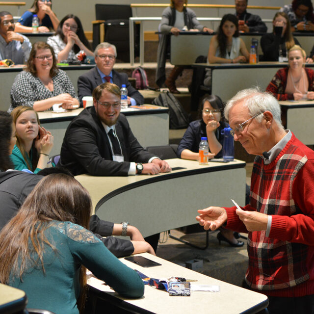 image of professor teaching students