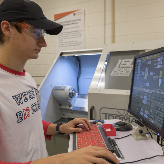 Image of student working on Tormach Lathe