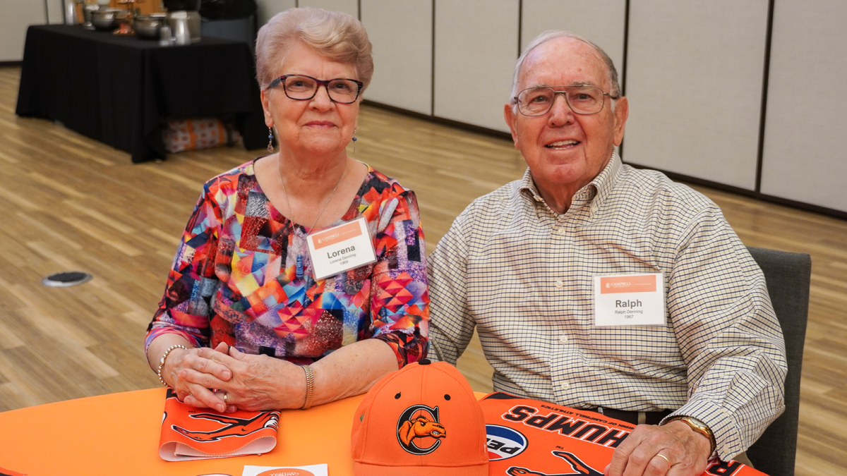 Man and woman attending Golden Club event.