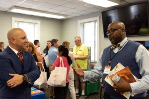 ministers and health professionals chat at the summit