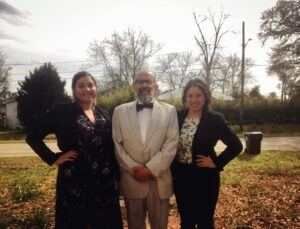 Campbell Law 3L Jacqui Figeroa poses with immigration attorney Marty Rosenbluth and his assistant outside the Stewart Detention Center in Lumpkin, Georgia