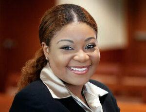 Photo of Tatiana Terry posing in the Boyce Courtroom.