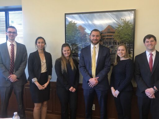 Photo of Willem Vis Hong Team posing in Dean's Conference room