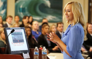 Judge Angelica McIntyre '13 speaks to 1Ls during orientation