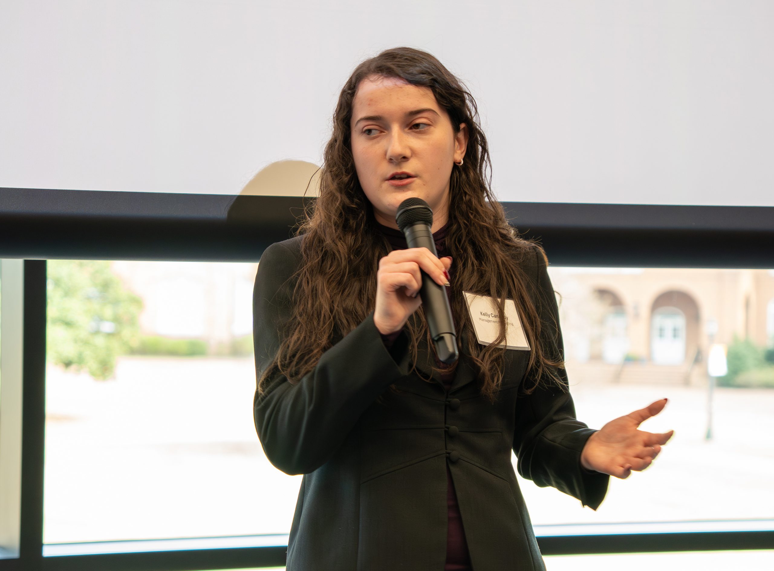 Student Kelly with microphone