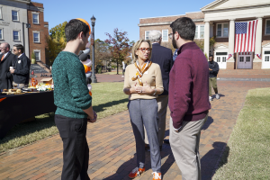 Campbell students and alumni chatting