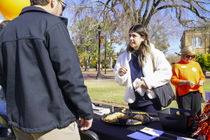 Campbell students grabbing snacks from table