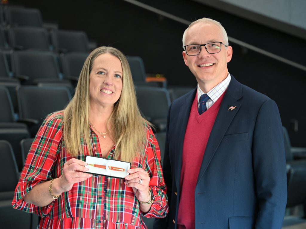 Shewmaker and Mercer standing together.