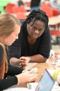 Students working on project together in lab