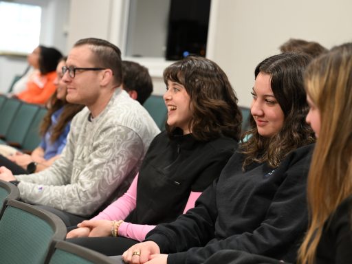 Students engaged in panel discussion