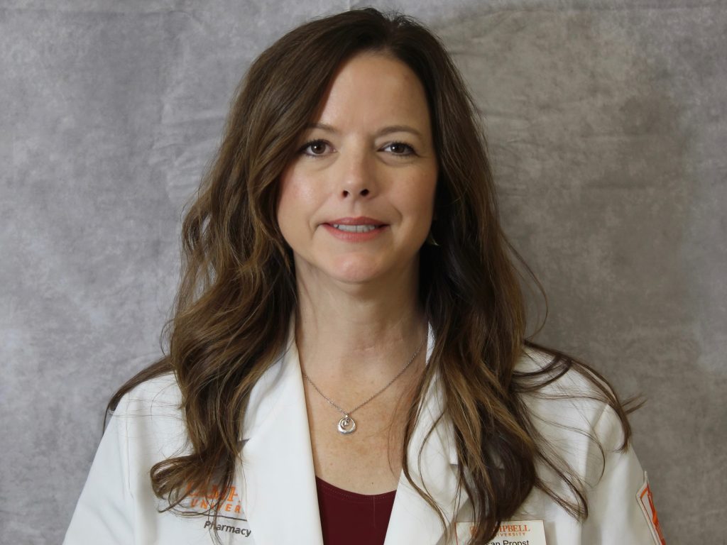 Susan Propst, PharmD Class of 2026 candidate, wearing her white coat