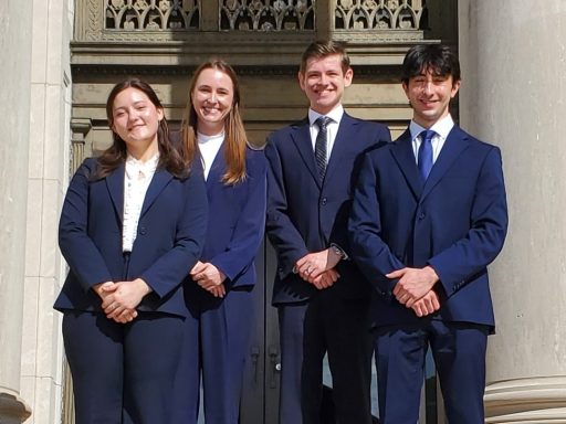 Photo of four Campbell Law advocates posing in front of courthouse in Baton Rouge at Bayou Challenge
