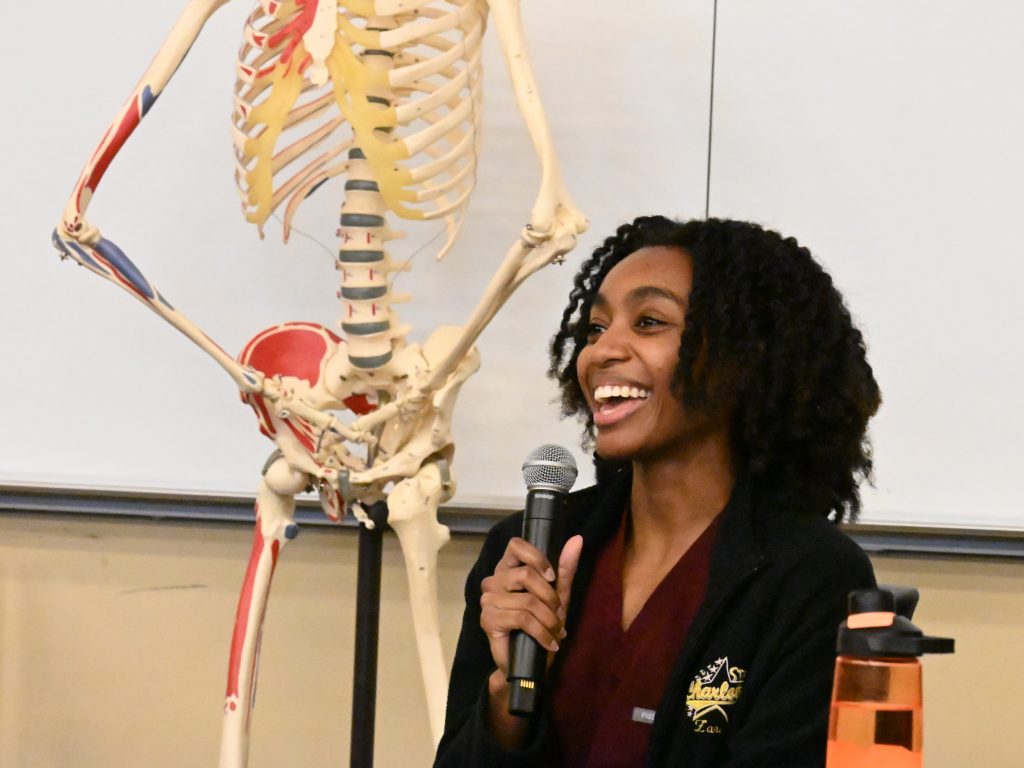 African-American student panelist with a big smile