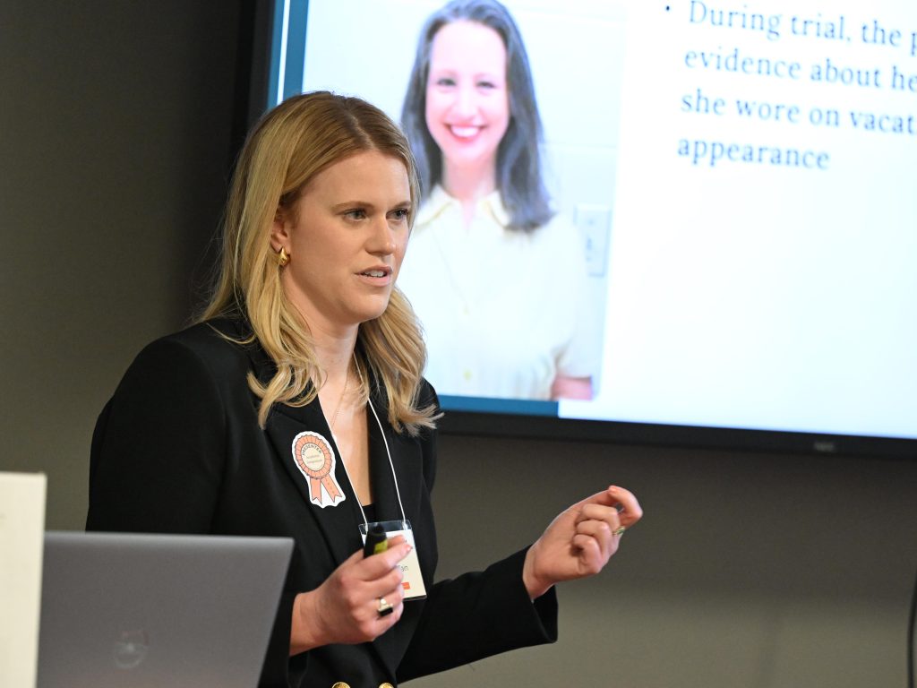 Photo of Law student LeAnn Cain '26 presenting at Symposium on March 24