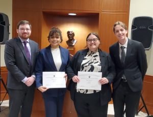 Photo of four people including Brittany Swanger and Grace Whittemore