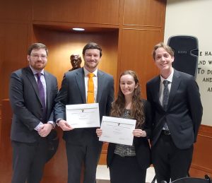 Photo of four people including Tanner Boone and Sabina Hess