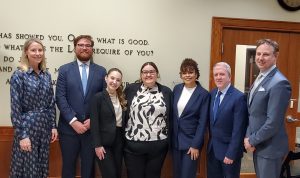 Photo of seven people including champions and judges