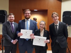 Photo of four people including Jackson Haskell and Rachael Cheeseman