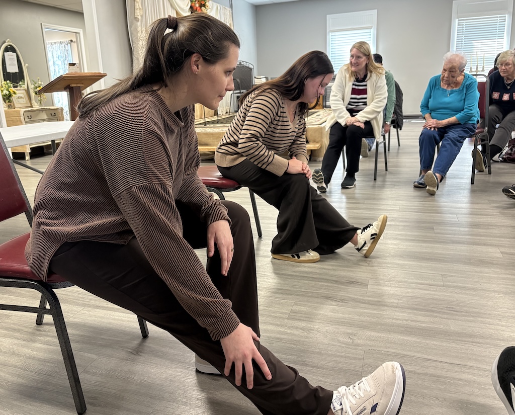 Students and older adults exercising