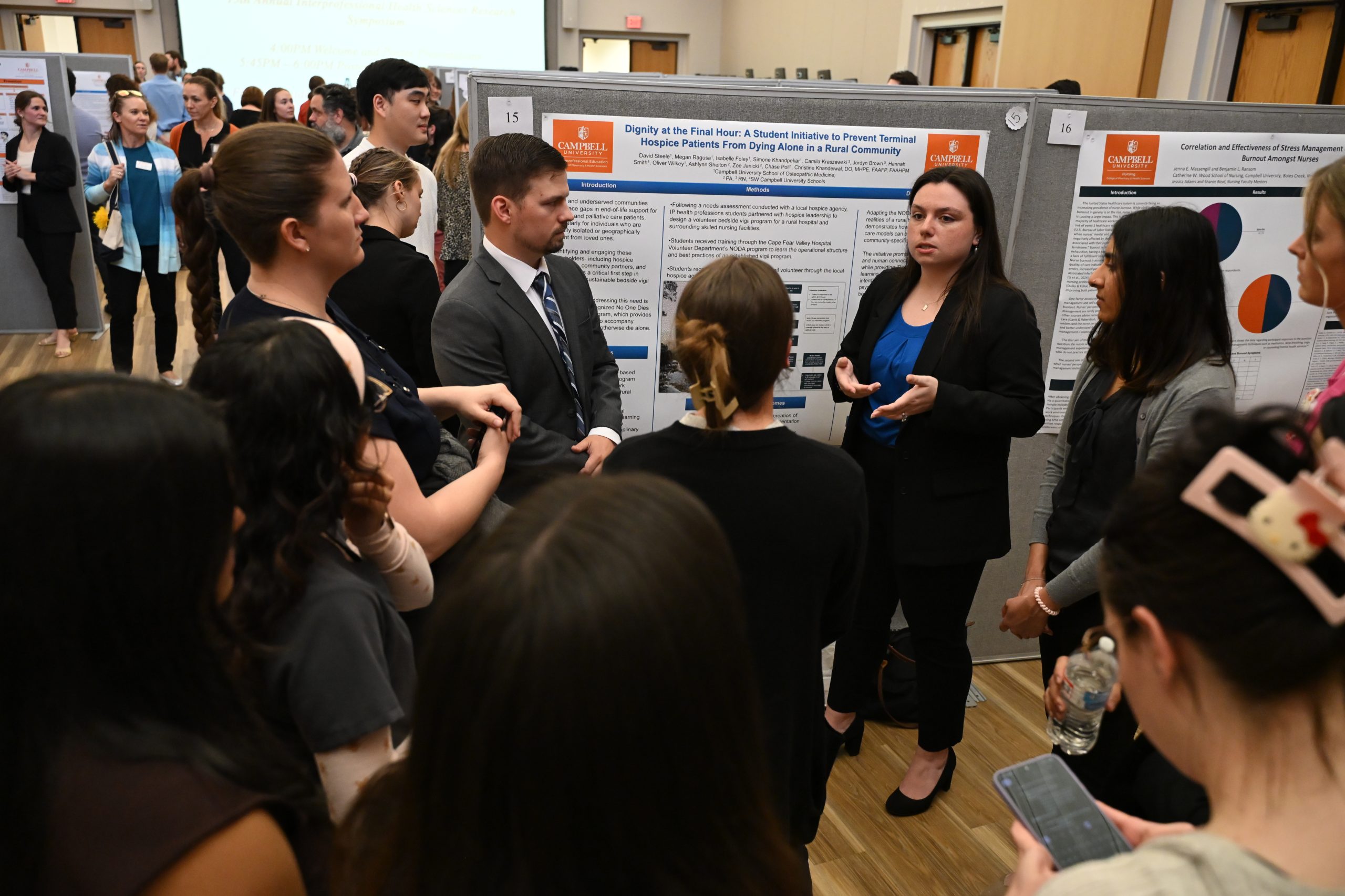 Group of students at a poster