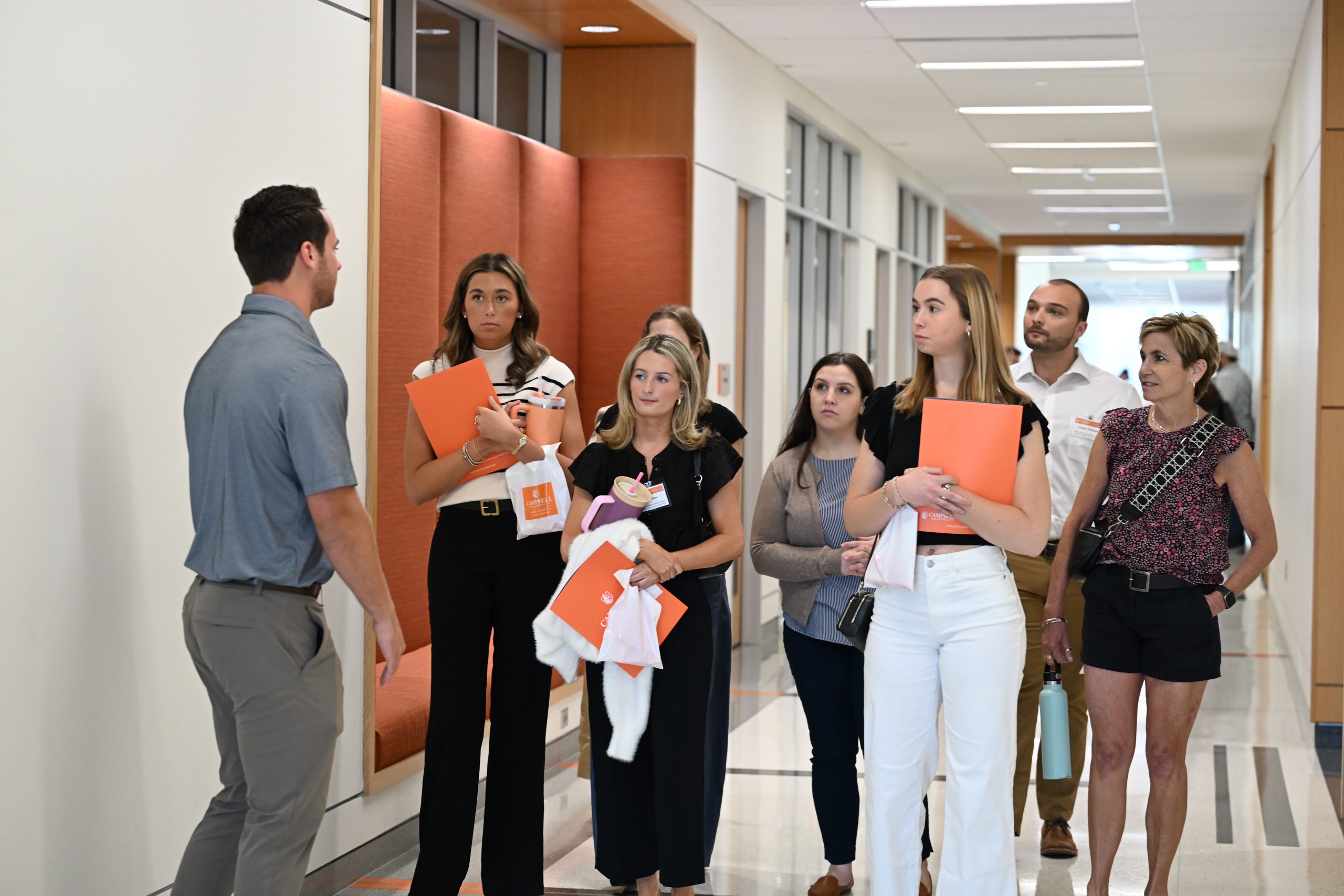 PA students leading a tour group in hallway of Smith Hall.