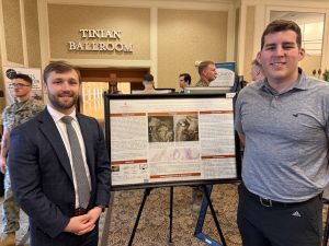 Students during annual Navy research symposium.