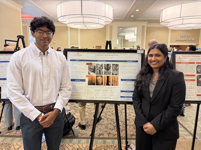 Photo of students during annual Navy research symposium.