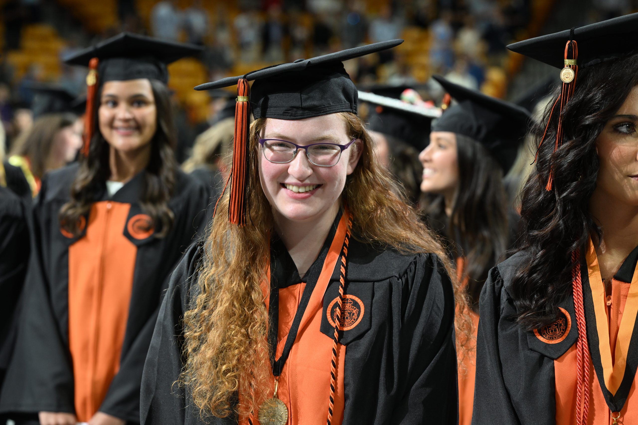 Female grad smiles