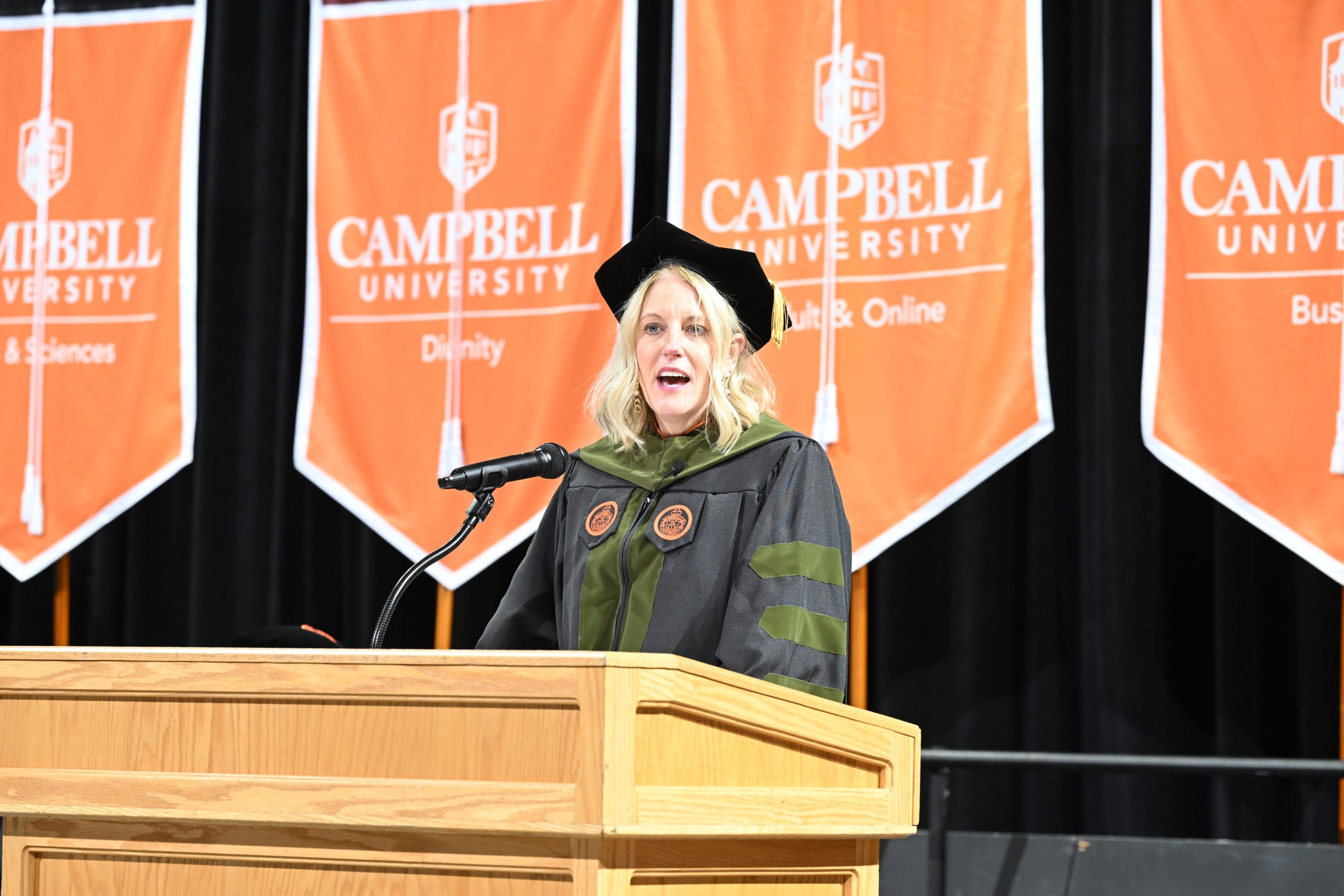 Dr. LeAnne Kennedy speaks at podium