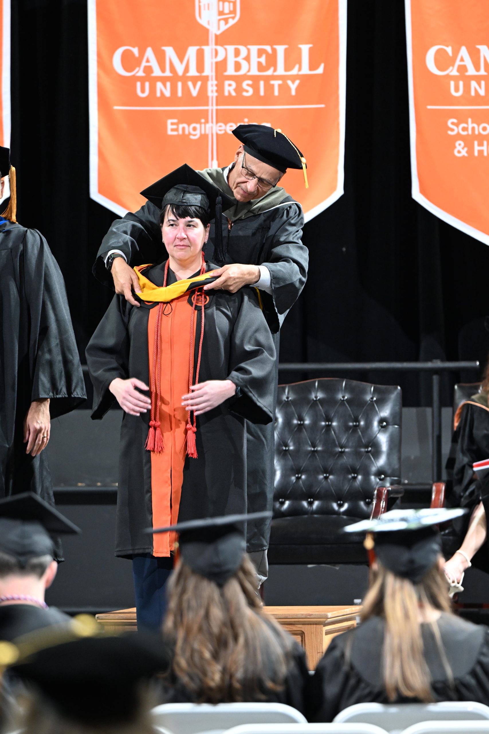 Female student being hooded