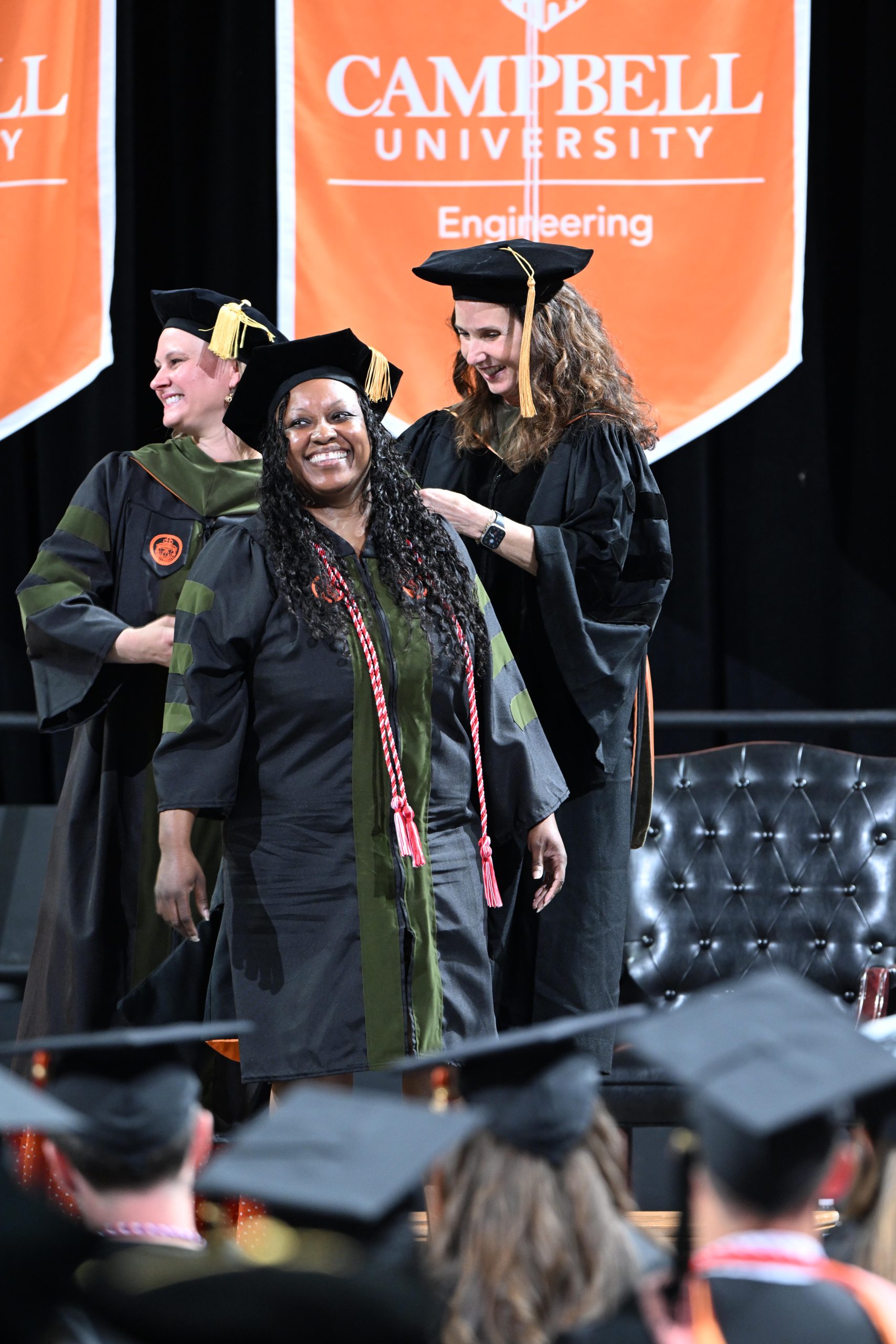 Female student being hooded