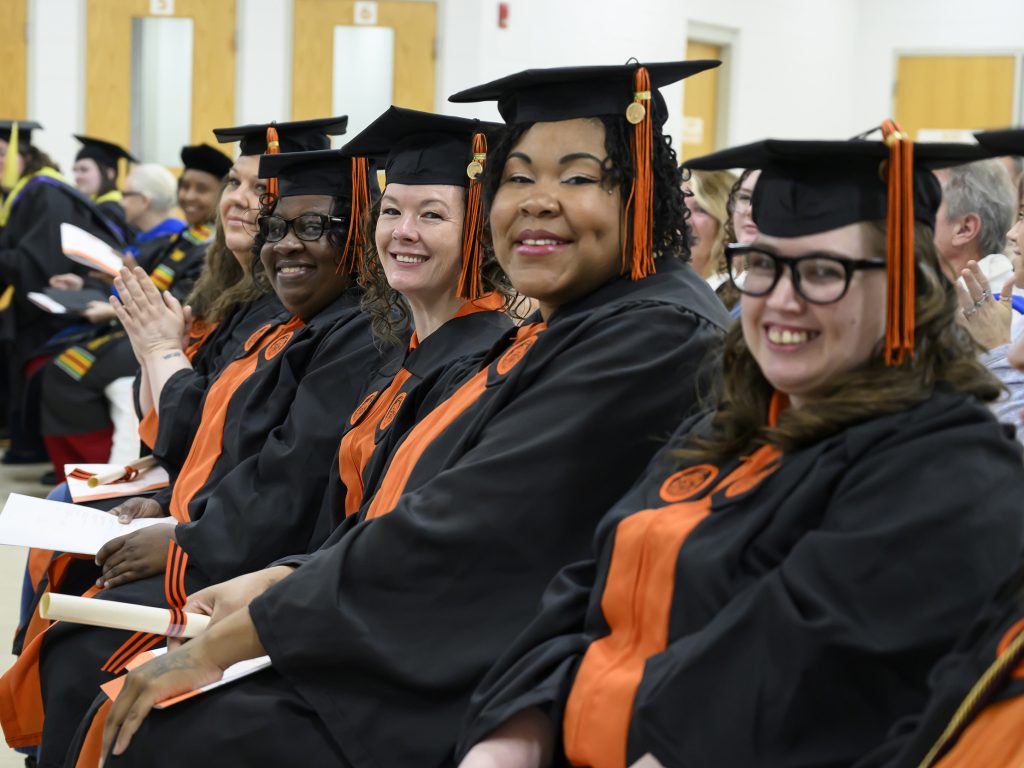 A group of four women from Anson Correctional Facility during the graduation ceremony as part of Campbell University’s Second Chance initiative.