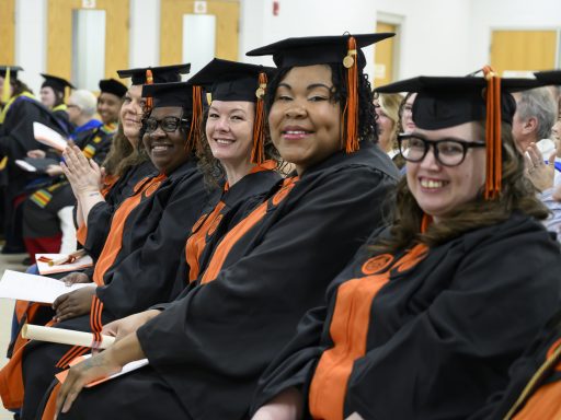 A group of four women from Anson Correctional Facility during the graduation ceremony as part of Campbell University’s Second Chance initiative.