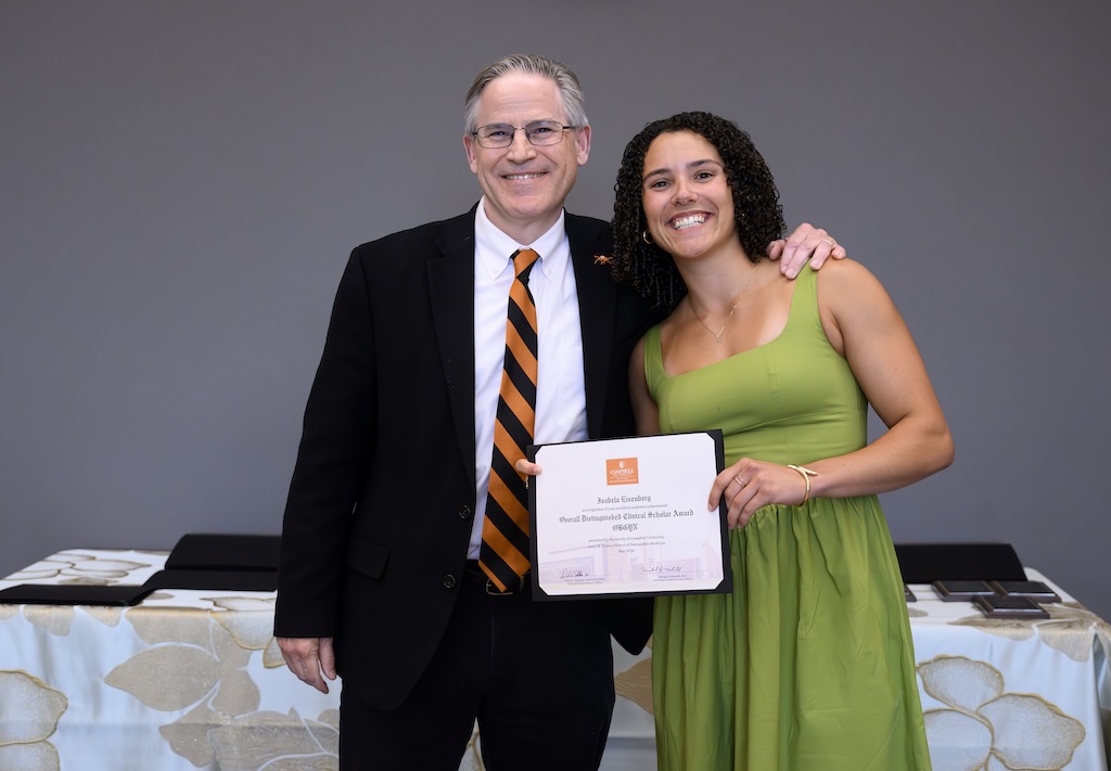 Posed photo of award recipients at CUSOM Class of 2026 Awards Dinner