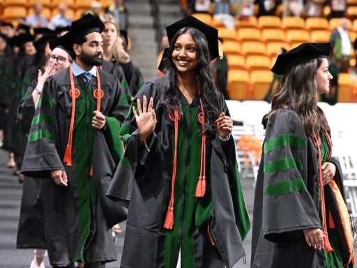 CUSOM graduates walk in ceremony