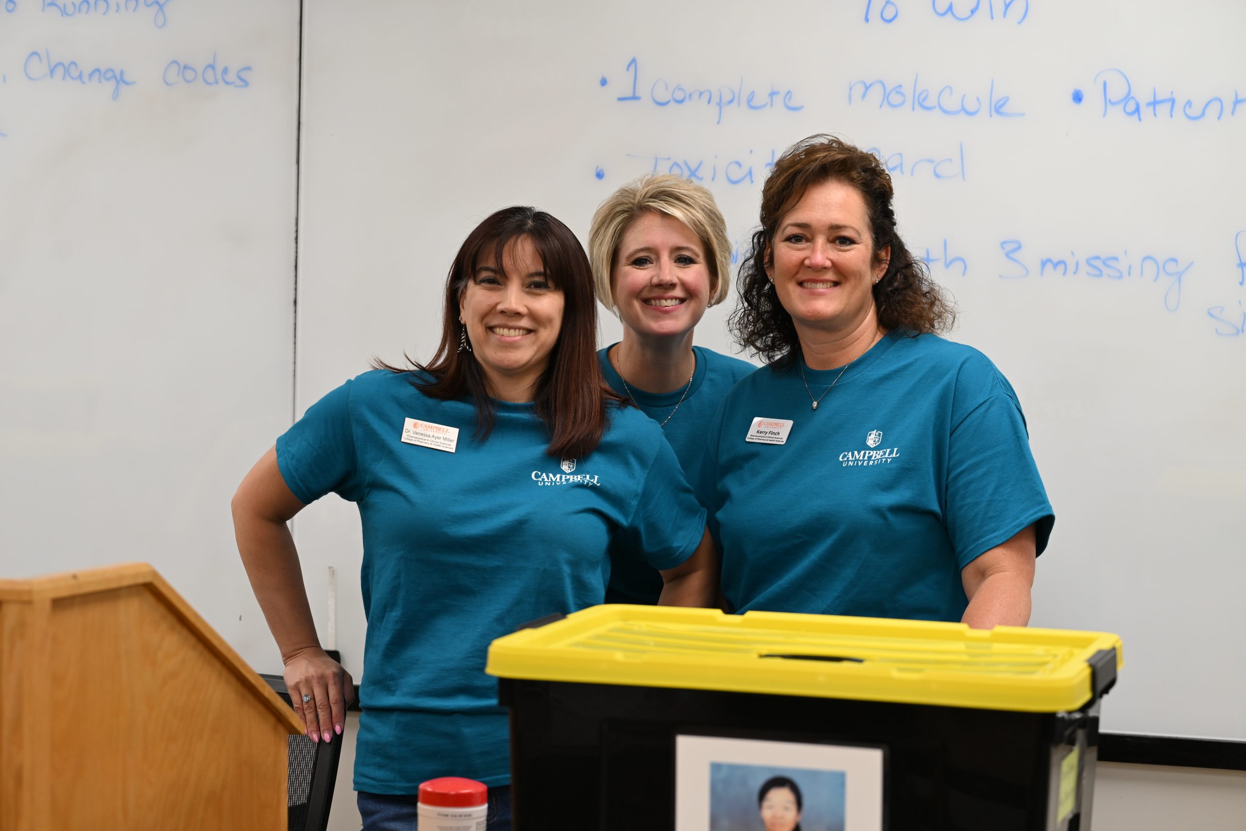 Campbell University STEM Camp faculty and staff pose together before leading activities for middle school campers.