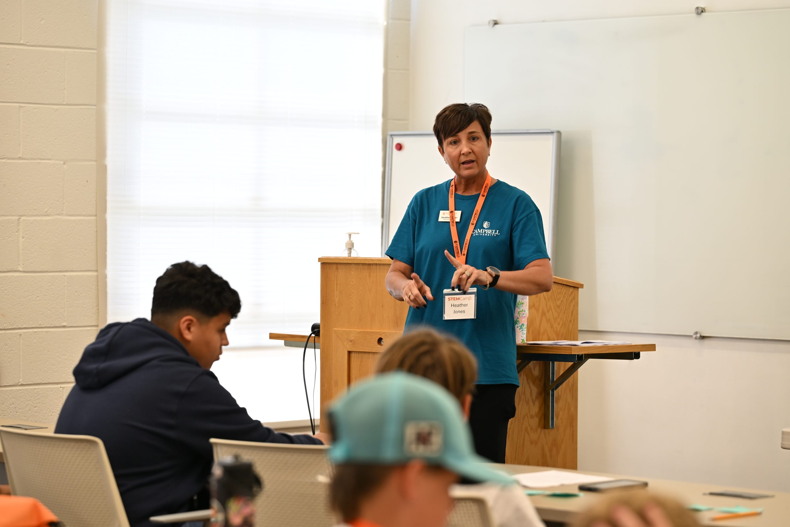 Campbell University STEM Camp instructor Heather Jones leads a classroom discussion with middle school campers.
